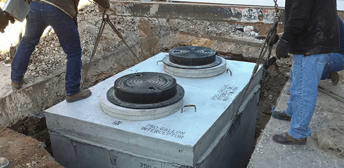 Grease trap installation for a commercial property drainage system in Colorado Springs, CO